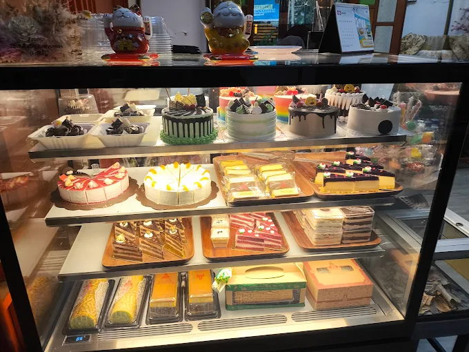 [Gambar kamar guesthouse yang rapi dan nyaman]